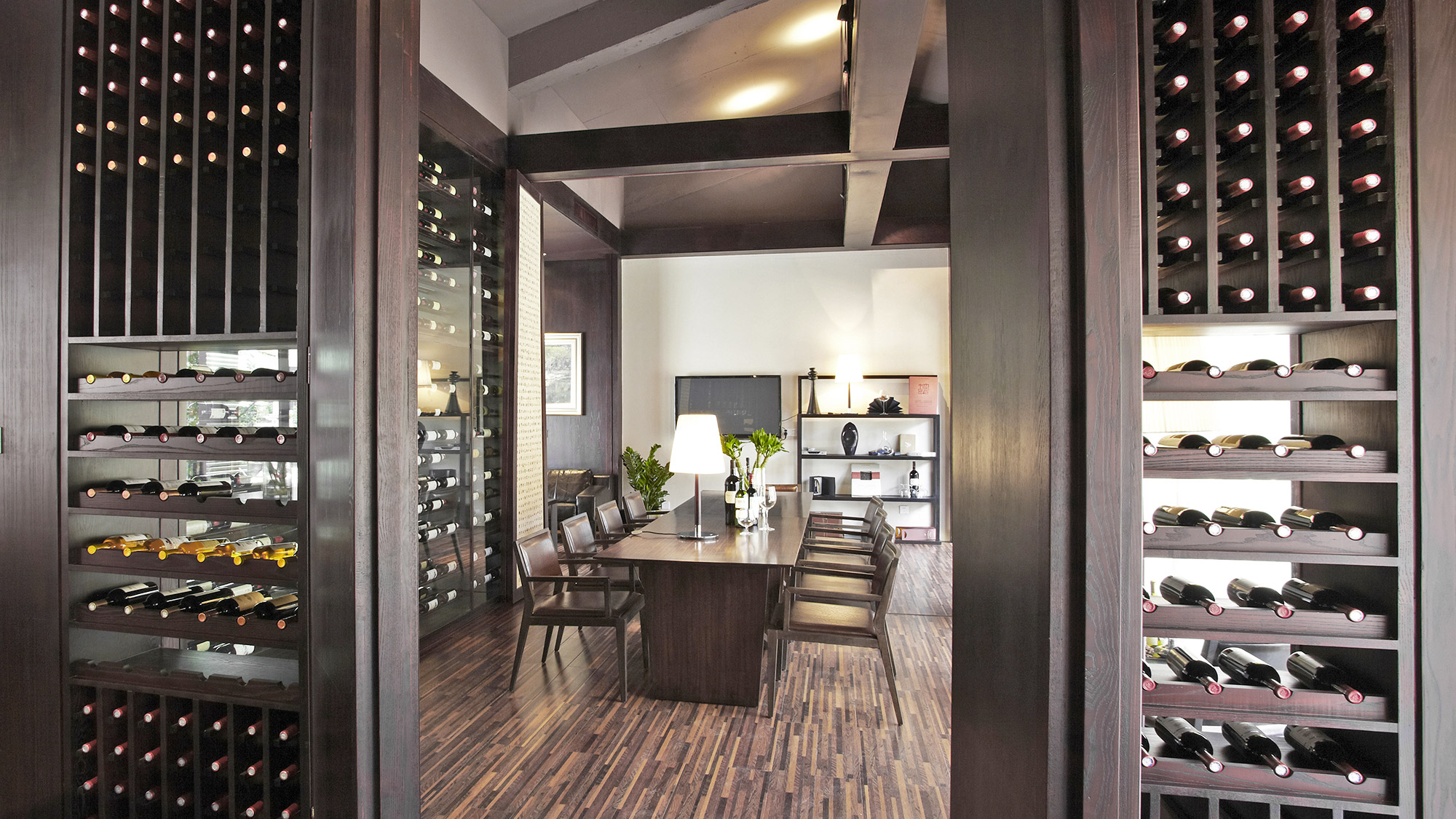 Wine cellar as a function of the dining room in a luxury home